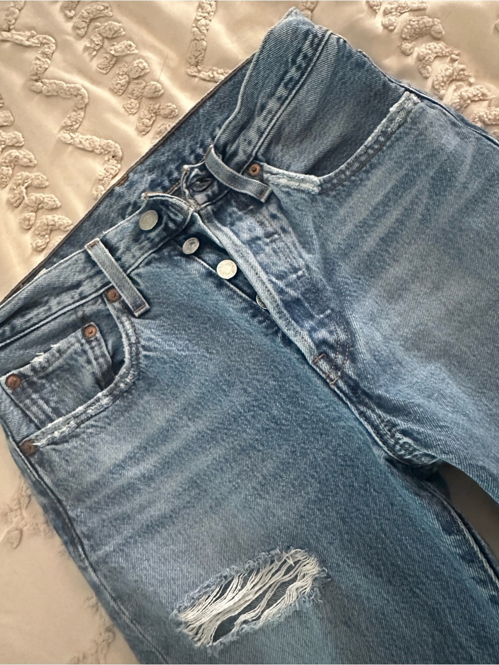 Levi's Light Blue Distressed Ankle Jeans